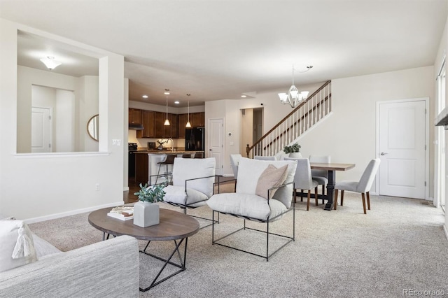 7367 S Pennsylvania St, Littleton, CO 80122 - living room with stairs, light colored carpet, a chandelier, and baseboards