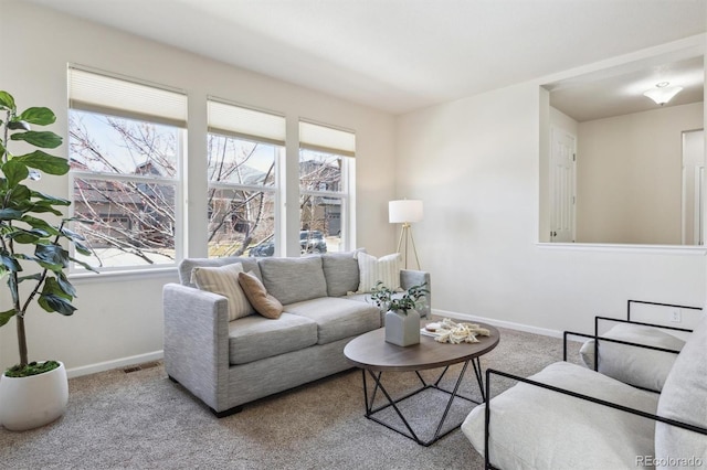 7367 S Pennsylvania St, Littleton, CO 80122 - living room featuring baseboards, carpet floors, and plenty of natural light