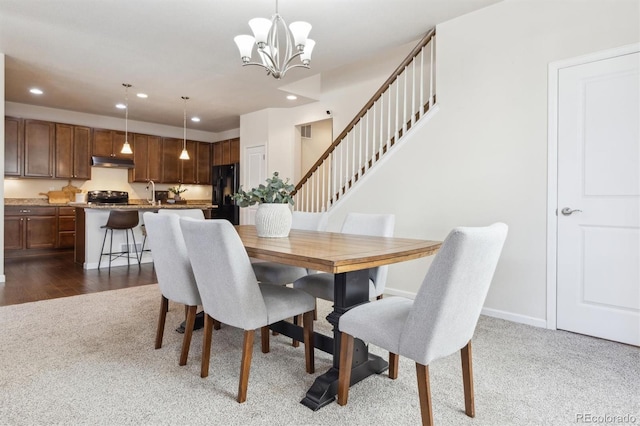 7367 S Pennsylvania St, Littleton, CO 80122 - dining room featuring dark colored carpet, recessed lighting, a chandelier, and baseboards