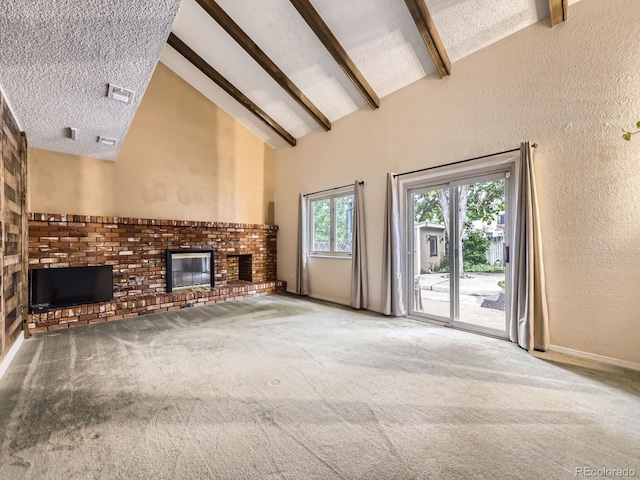 9150 Garrison St, Broomfield, CO 80021 - unfurnished living room featuring a textured wall, high vaulted ceiling, a fireplace, beam ceiling, and carpet