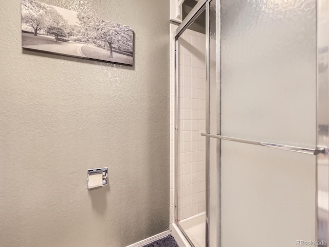 9150 Garrison St, Broomfield, CO 80021 - full bathroom with a textured wall and a stall shower