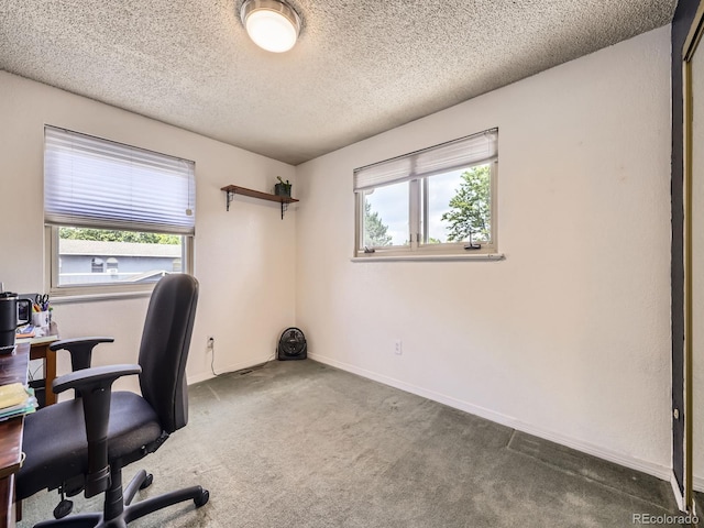 9150 Garrison St, Broomfield, CO 80021 - carpeted office featuring a textured ceiling and baseboards