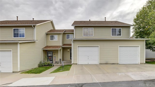 view of front of property with a garage