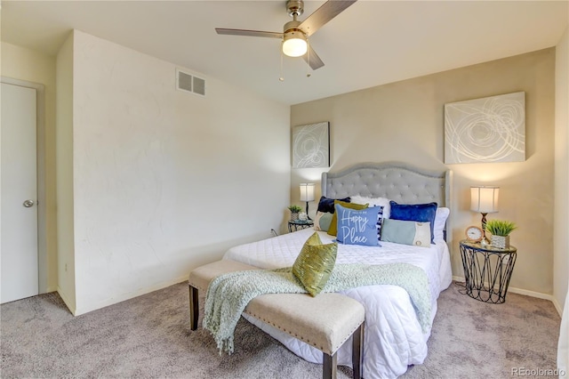 bedroom featuring ceiling fan and light carpet