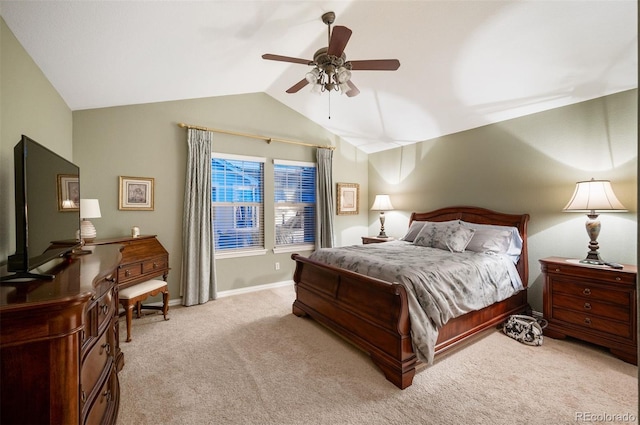 carpeted bedroom featuring vaulted ceiling and ceiling fan