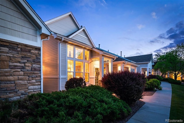 view of property exterior at dusk