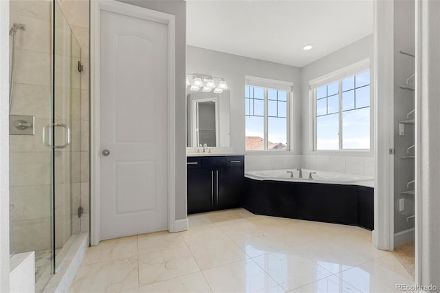 7606 S Valleyhead Ct, Aurora, CO 80016 - full bathroom with a bath, a stall shower, and vanity