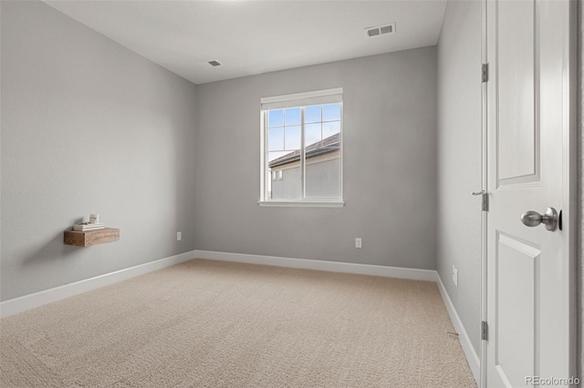 7606 S Valleyhead Ct, Aurora, CO 80016 - spare room featuring light colored carpet and baseboards