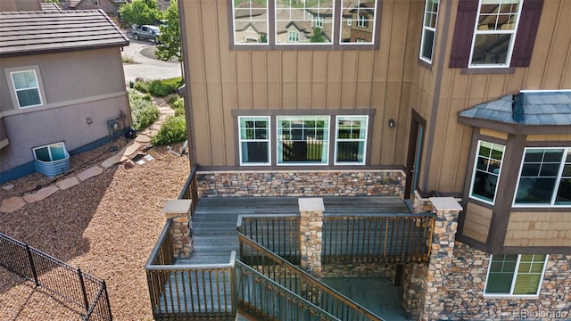 7606 S Valleyhead Ct, Aurora, CO 80016 - exterior space featuring board and batten siding and stone siding