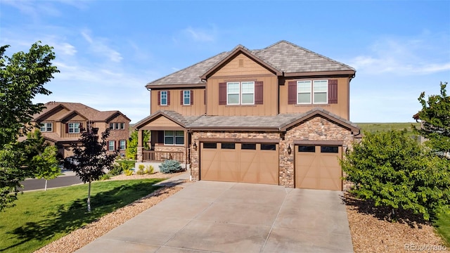 7606 S Valleyhead Ct, Aurora, CO 80016 - craftsman-style house featuring board and batten siding, concrete driveway, a garage, and stone siding