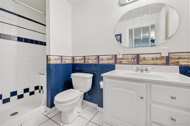 6510 Packsaddle Ct, Colorado Springs, CO 80922 - full bath featuring a shower stall, vanity, and tile patterned floors