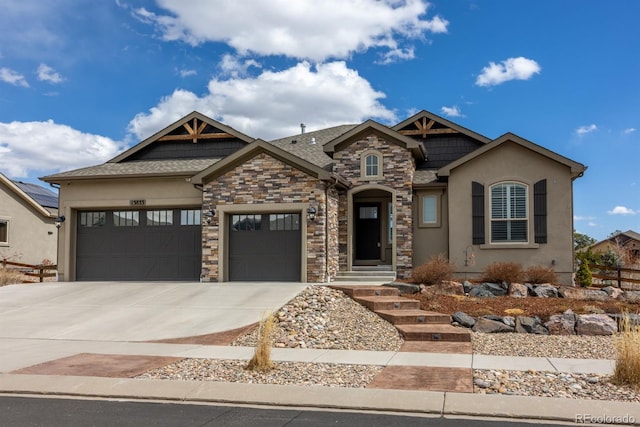 13833 Rivercrest Cir, Colorado Springs, CO 80921 - craftsman house with a garage, concrete driveway, stone siding, stucco siding, and a shingled roof