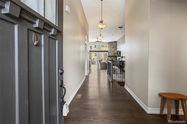 13833 Rivercrest Cir, Colorado Springs, CO 80921 - entryway featuring baseboards, wood finished floors, and ceiling fan