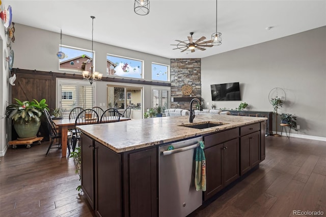 13833 Rivercrest Cir, Colorado Springs, CO 80921 - kitchen featuring stainless steel dishwasher, a sink, a ceiling fan, and dark brown cabinets