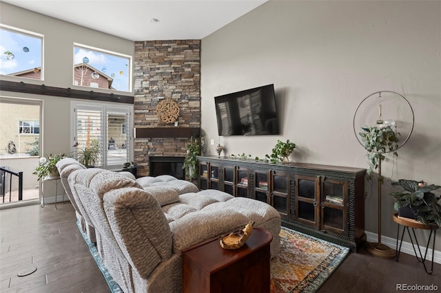 13833 Rivercrest Cir, Colorado Springs, CO 80921 - living area with baseboards, hardwood / wood-style floors, and a fireplace
