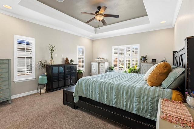 13833 Rivercrest Cir, Colorado Springs, CO 80921 - carpeted bedroom with a raised ceiling, multiple windows, ornamental molding, recessed lighting, and baseboards