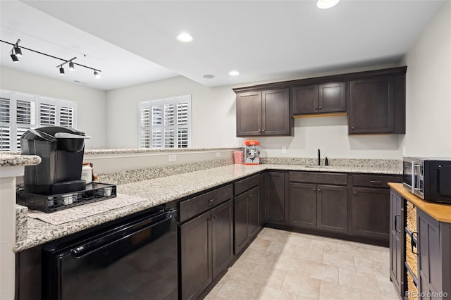 13833 Rivercrest Cir, Colorado Springs, CO 80921 - kitchen with stainless steel microwave, dishwasher, dark brown cabinets, light stone countertops, and recessed lighting