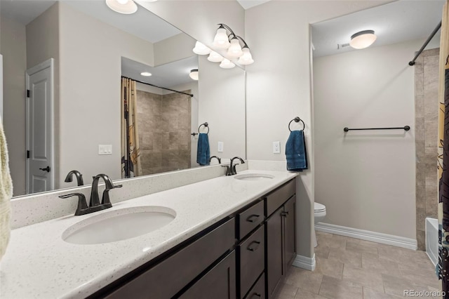 13833 Rivercrest Cir, Colorado Springs, CO 80921 - full bath featuring toilet, double vanity, baseboards, and shower / bath combo with shower curtain