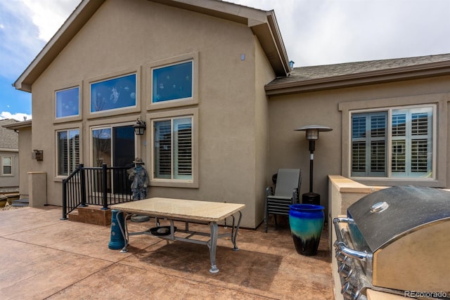 13833 Rivercrest Cir, Colorado Springs, CO 80921 - back of property featuring stucco siding and a patio