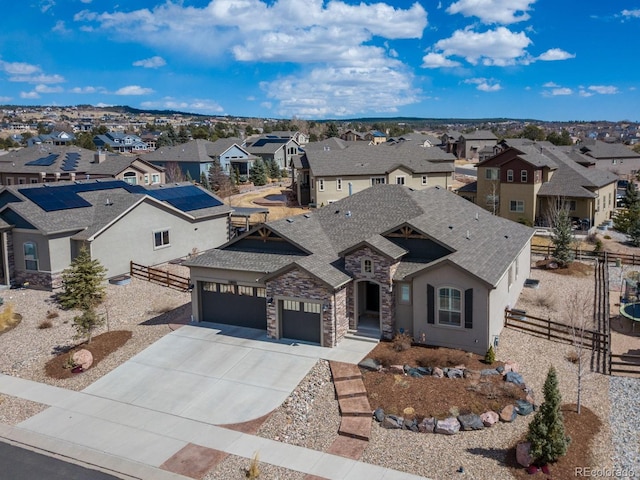 13833 Rivercrest Cir, Colorado Springs, CO 80921 - view of front of home with a residential view, a shingled roof, an attached garage, and driveway