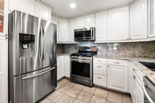 6336 W 71st Pl, Arvada, CO 80003 - kitchen featuring stainless steel appliances, white cabinets, backsplash, and recessed lighting