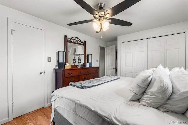 6336 W 71st Pl, Arvada, CO 80003 - bedroom featuring light wood-type flooring, a closet, and ceiling fan