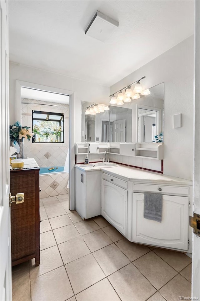 6336 W 71st Pl, Arvada, CO 80003 - full bath with vanity and tile patterned flooring