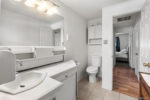 6336 W 71st Pl, Arvada, CO 80003 - bathroom featuring tile patterned floors and vanity
