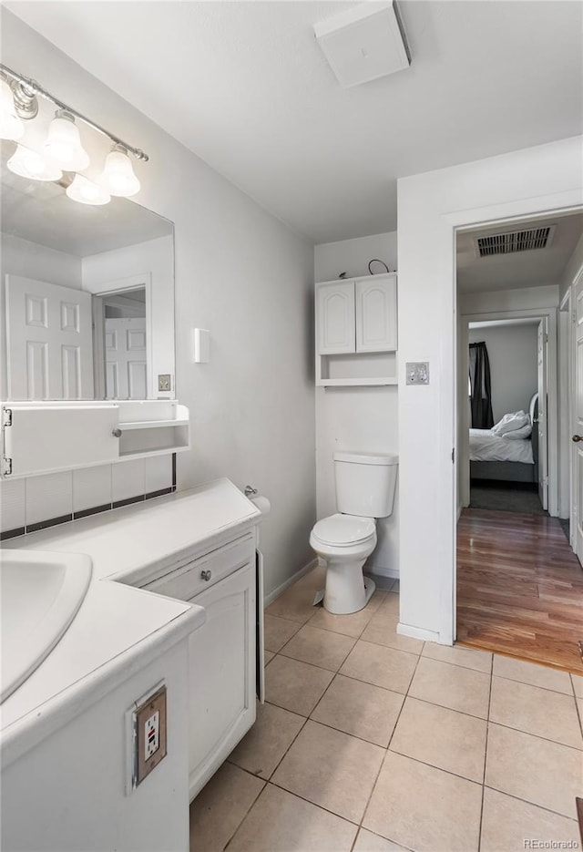6336 W 71st Pl, Arvada, CO 80003 - bathroom with tile patterned floors and vanity