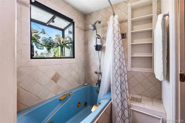 6336 W 71st Pl, Arvada, CO 80003 - full bath featuring a combined bath / shower with jetted tub and tile walls