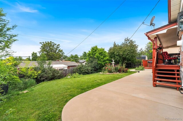 6336 W 71st Pl, Arvada, CO 80003 - view of yard featuring a patio and a wooden deck