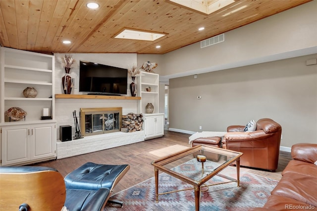 1540 Fawnwood Rd, Monument, CO 80132 - living room with wooden ceiling, a skylight, baseboards, recessed lighting, and wood finished floors