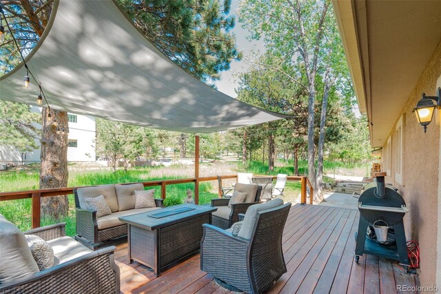 1540 Fawnwood Rd, Monument, CO 80132 - wooden terrace featuring an outdoor hangout area and a grill