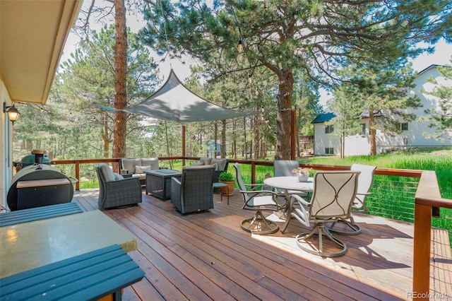 1540 Fawnwood Rd, Monument, CO 80132 - wooden terrace with an outdoor hangout area and outdoor dining space