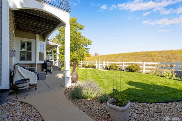 view of yard with a patio area and fence