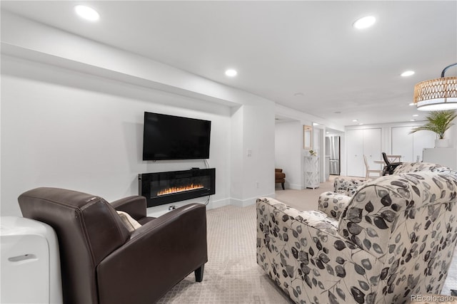 3235 E Easter Pl, Centennial, CO 80122 - living area featuring light colored carpet, recessed lighting, and a glass covered fireplace