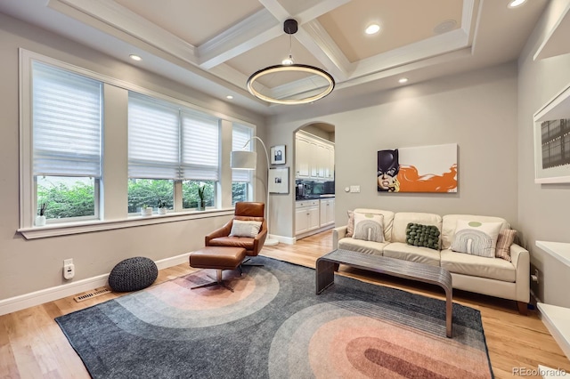 714 Skywalker Pt, Lafayette, CO 80026 - living room with light wood finished floors, recessed lighting, arched walkways, coffered ceiling, and beamed ceiling