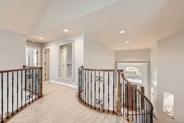 714 Skywalker Pt, Lafayette, CO 80026 - hallway featuring an upstairs landing, recessed lighting, lofted ceiling, and carpet flooring