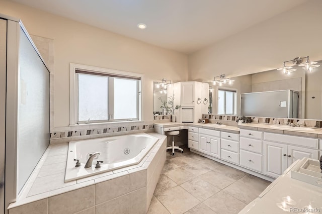 714 Skywalker Pt, Lafayette, CO 80026 - full bath with a jetted tub, double vanity, a shower stall, and tile patterned floors
