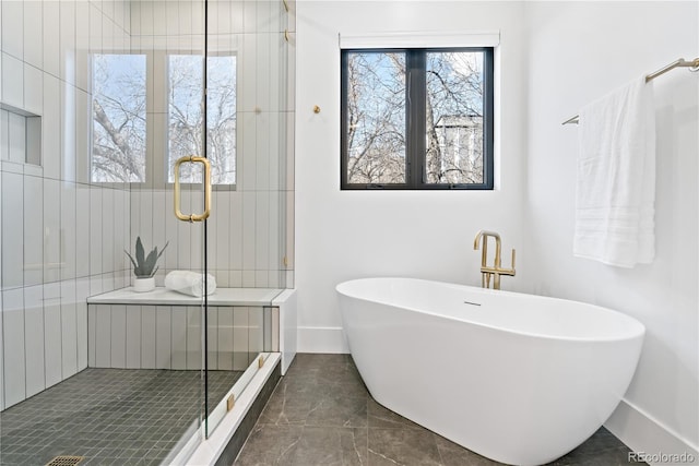 bathroom featuring shower with separate bathtub and tile patterned floors