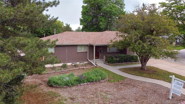 7140 S Uinta St, Centennial, CO 80112 - ranch-style home with brick siding and driveway