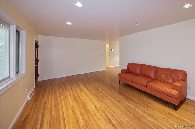 7140 S Uinta St, Centennial, CO 80112 - living area with light wood-type flooring, recessed lighting, and baseboards