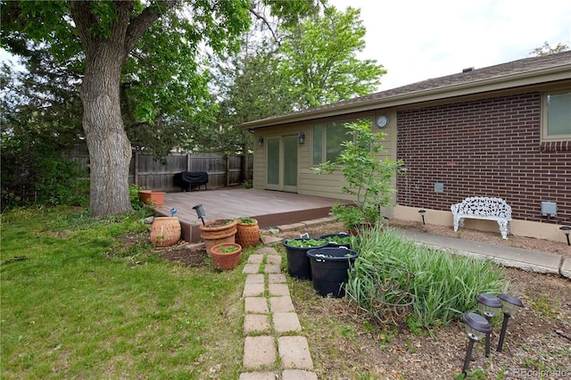 7140 S Uinta St, Centennial, CO 80112 - view of yard with a wooden deck