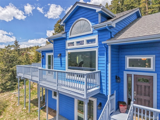 33633 Elk Run, Evergreen, CO 80439 - view of front of home featuring roof with shingles and a deck