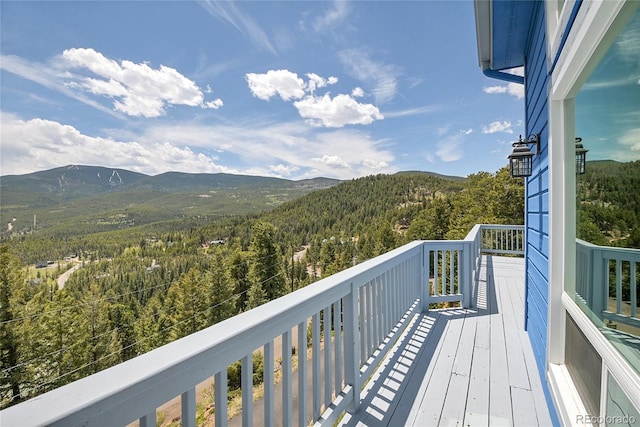 33633 Elk Run, Evergreen, CO 80439 - balcony with a wooded view and a mountain view