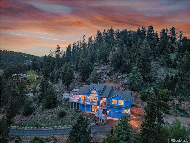 33633 Elk Run, Evergreen, CO 80439 - aerial view at dusk of a wooded view