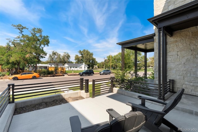 view of patio featuring a porch