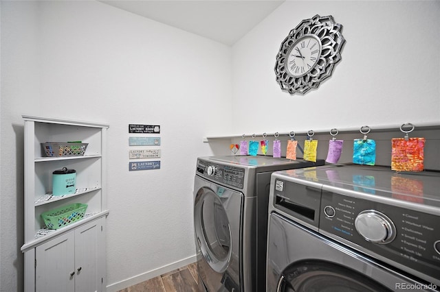 1485 Captiva Beach Ln, Monument, CO 80132 - laundry room with washing machine and clothes dryer, dark wood finished floors, and cabinet space