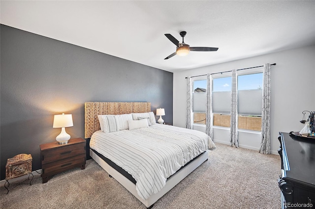 1485 Captiva Beach Ln, Monument, CO 80132 - carpeted bedroom featuring baseboards and a ceiling fan
