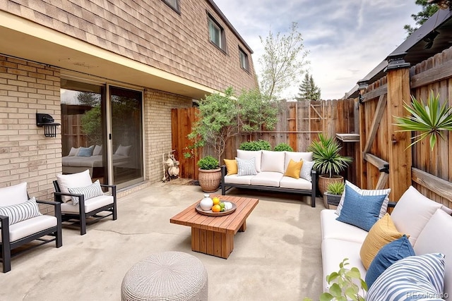 view of patio / terrace featuring a fenced backyard and outdoor lounge area